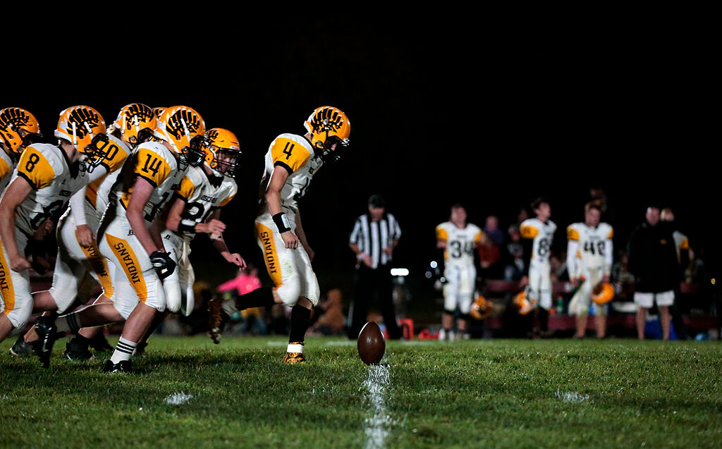 Members of the Osceola High School football team prepare for an onside kick at the Osceola versus Appleton City eight-man football game on Friday, Oct. 2, in Appleton City, Mo.